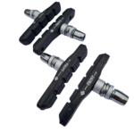 roduct Overview: Upgrade your bike’s braking performance with these 2 pairs of 70 T-A V-brake shoes. Designed for both aluminium and steel rims, these asymmetrical brake blocks deliver precise, reliable stopping power for all types of V-brake bikes. Each block comes with a threaded bolt and adjusting shims, allowing for perfect alignment and easy installation. Key Features: Volume: 2 pairs (4 brake blocks) Type: V-brake shoes Compatibility: Aluminium and steel rims Design: Asymmetrical for optimal contact with rim surface Hardware: Bolt with thread and adjusting shims included for easy adjustment Packaging: OEM packaging Article Number: 361720 Why Choose 70 T-A V-Brake Shoes? Asymmetrical design ensures even braking and reduces rim wear Threaded bolts and shims allow for fine-tuned alignment Suitable for both aluminium and steel rims for versatile use Durable OEM construction ensures long-lasting performance Compatibility & Application: Ideal for all standard V-brake bikes. Perfect upgrade or replacement for worn-out brake blocks, ensuring smooth and safe braking every ride. Why Choose Hopkinson Cycles? ✅ Free postage on all orders ✅ Expert advice from cycling professionals ✅ Family-run business with personalized customer service ✅ Direct contact: speak to a real person, not a faceless system ✅ In-house operations for quality assurance and fast dispatch Contact Us: 📞 01924 274209 📧 info@hopkinsoncycles.com 🌐 www.hopkinsoncycles.com Visit Hopkinson Cycles for quality bike parts and expert advice.
