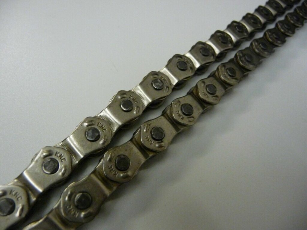 KMC HL1 Half Link BMX Chain - 1/2" X 1/8", 100 Links, Nickel Plated, Maximum Adjustability For Single Speed Bikes